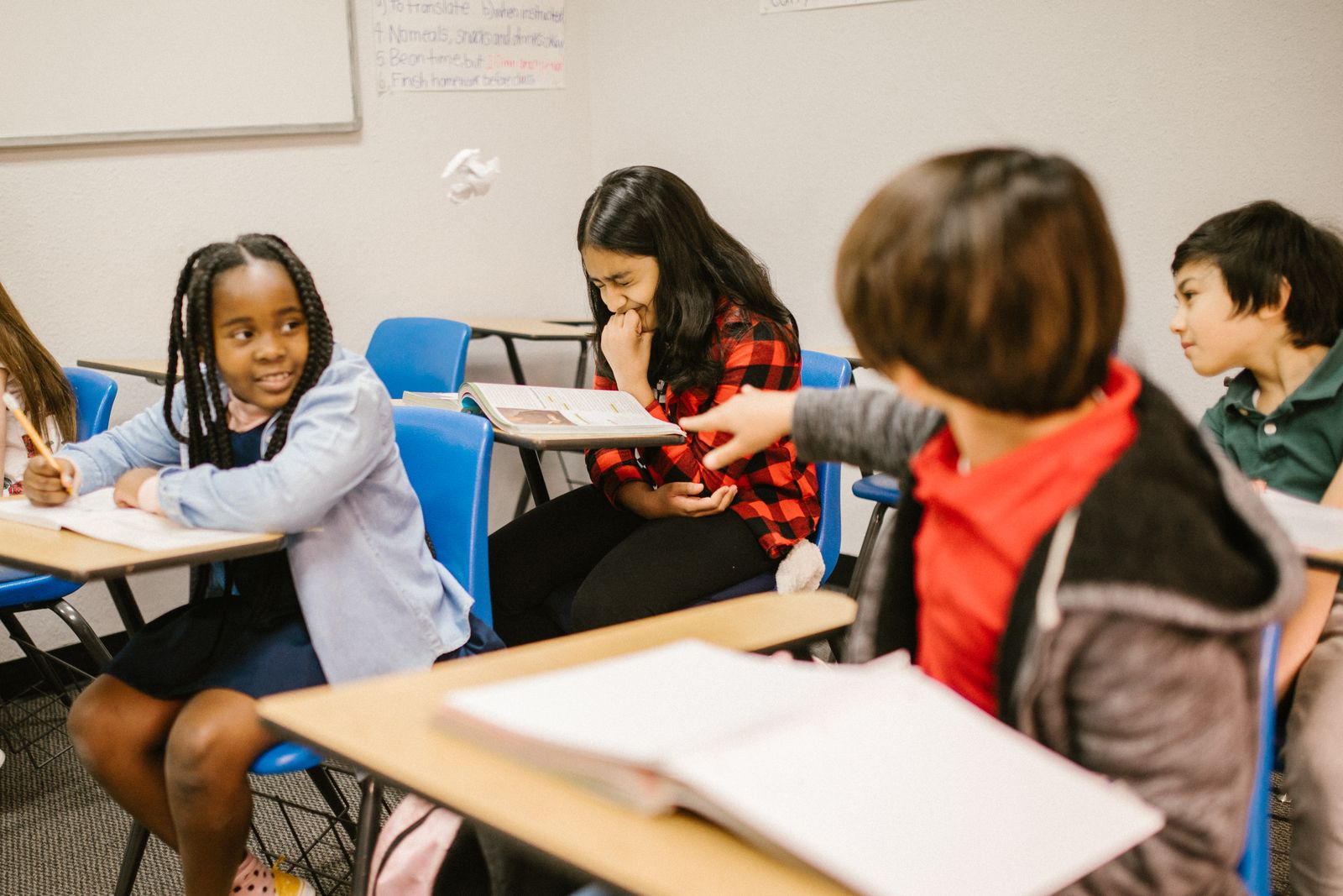 Children in a classroom peer interaction