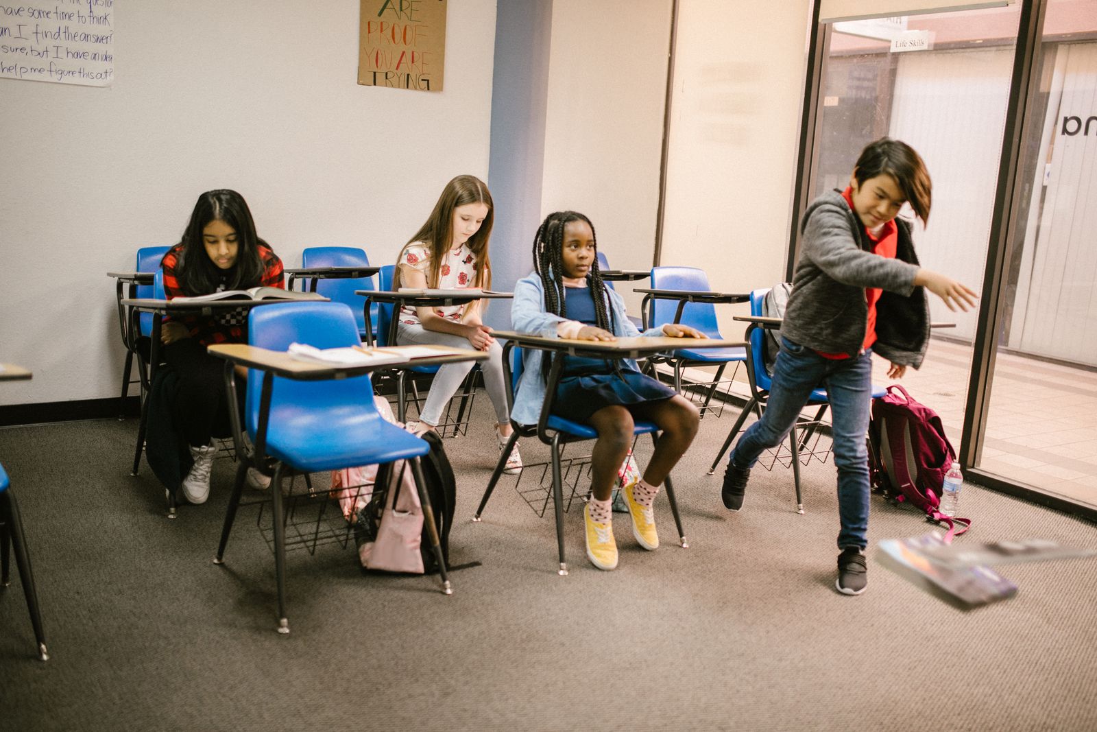 Students in a classroom peer interaction