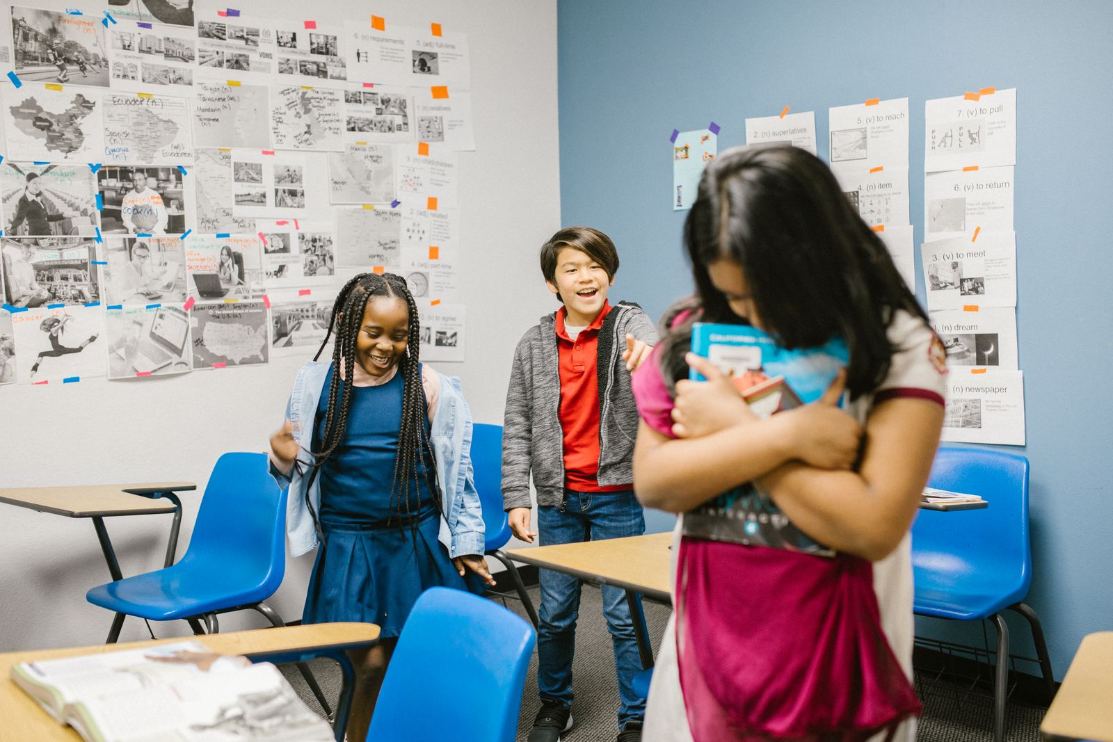 Diverse students in a classroom peer setting