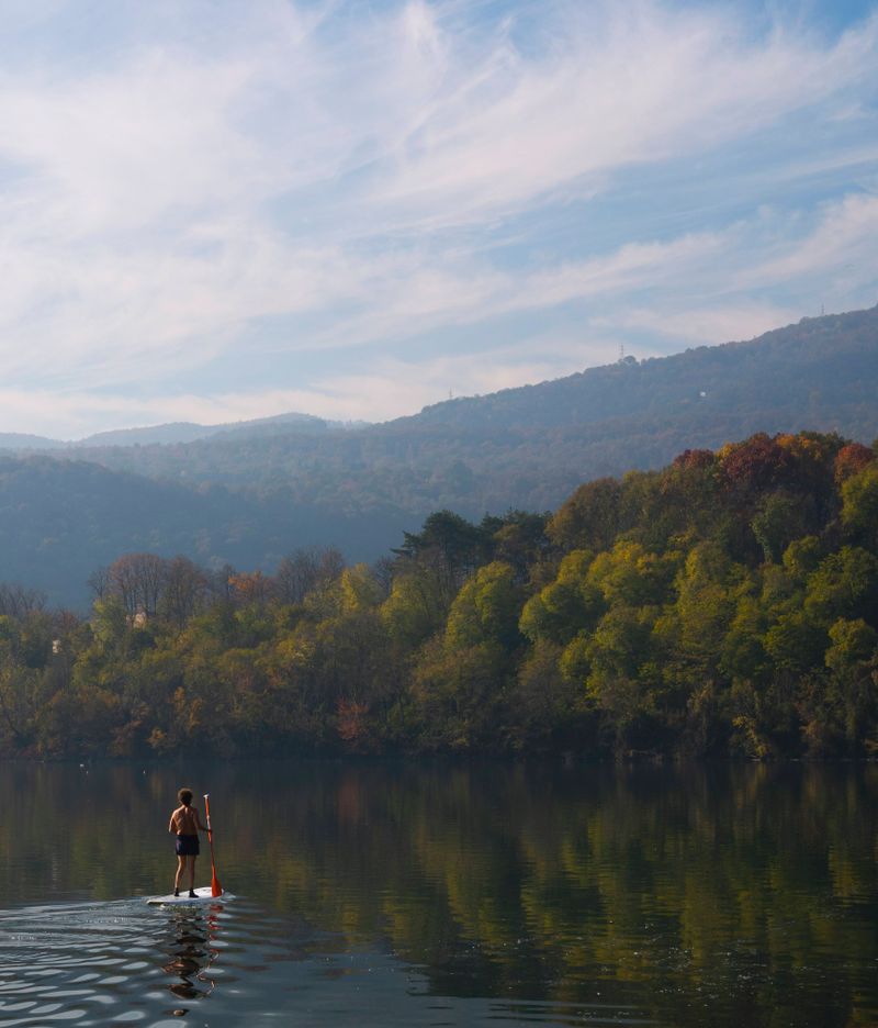 Paddleboard yoga on Coniston Water during Wednesday’s retreat itinerary.