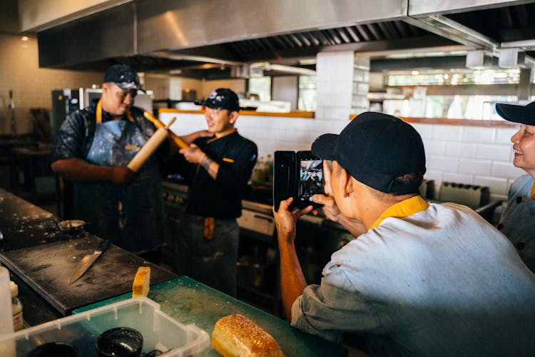 Kitchen Workers Having Fun At Work