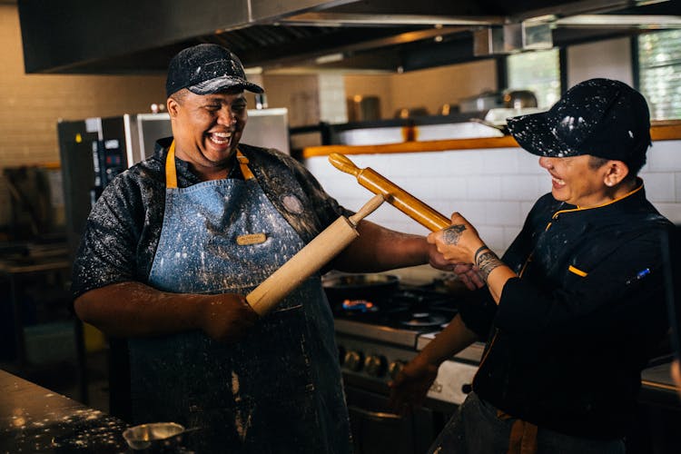 Kitchen Workers Having Fun Moments In The Kitchen