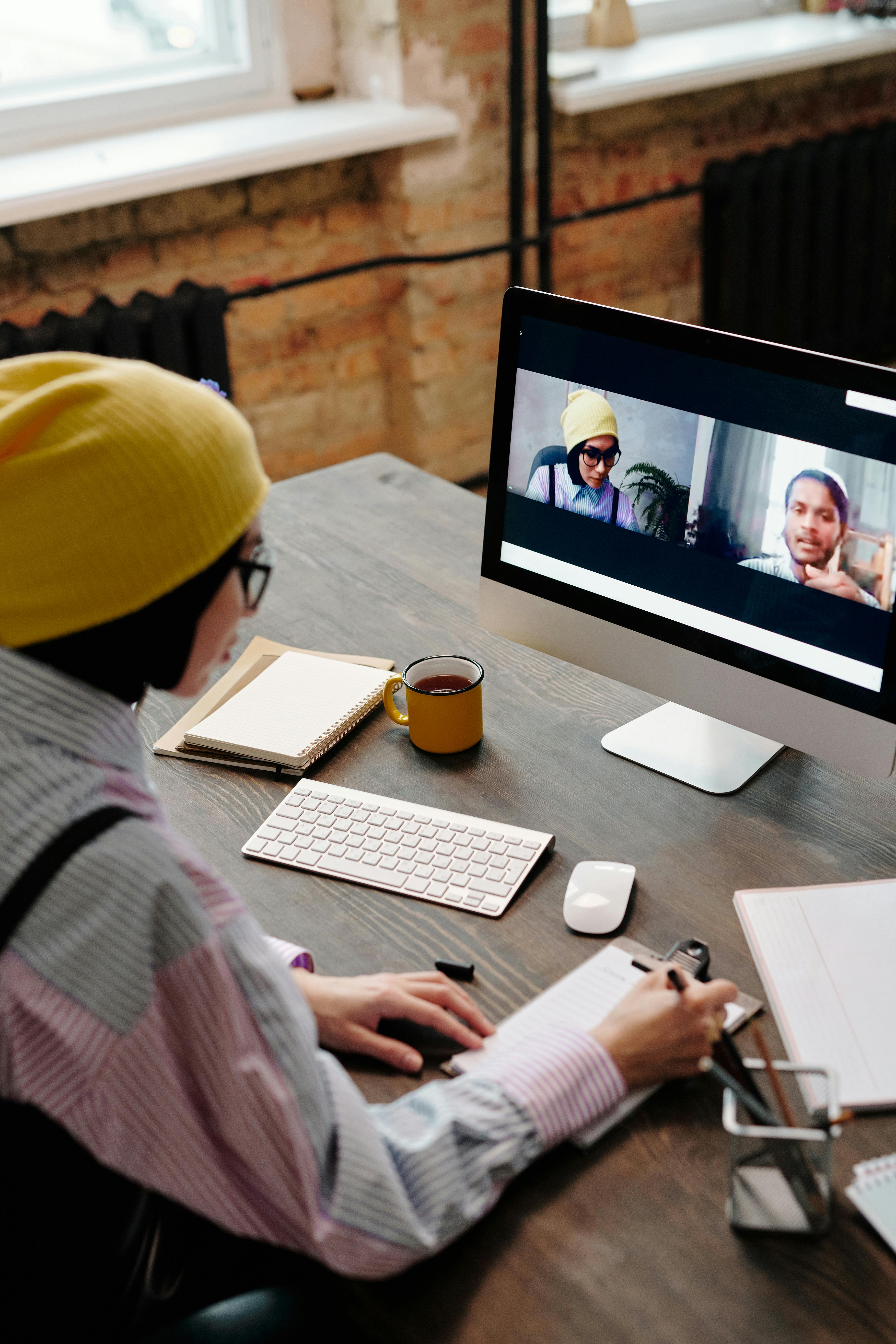 woman talking on video call on computer