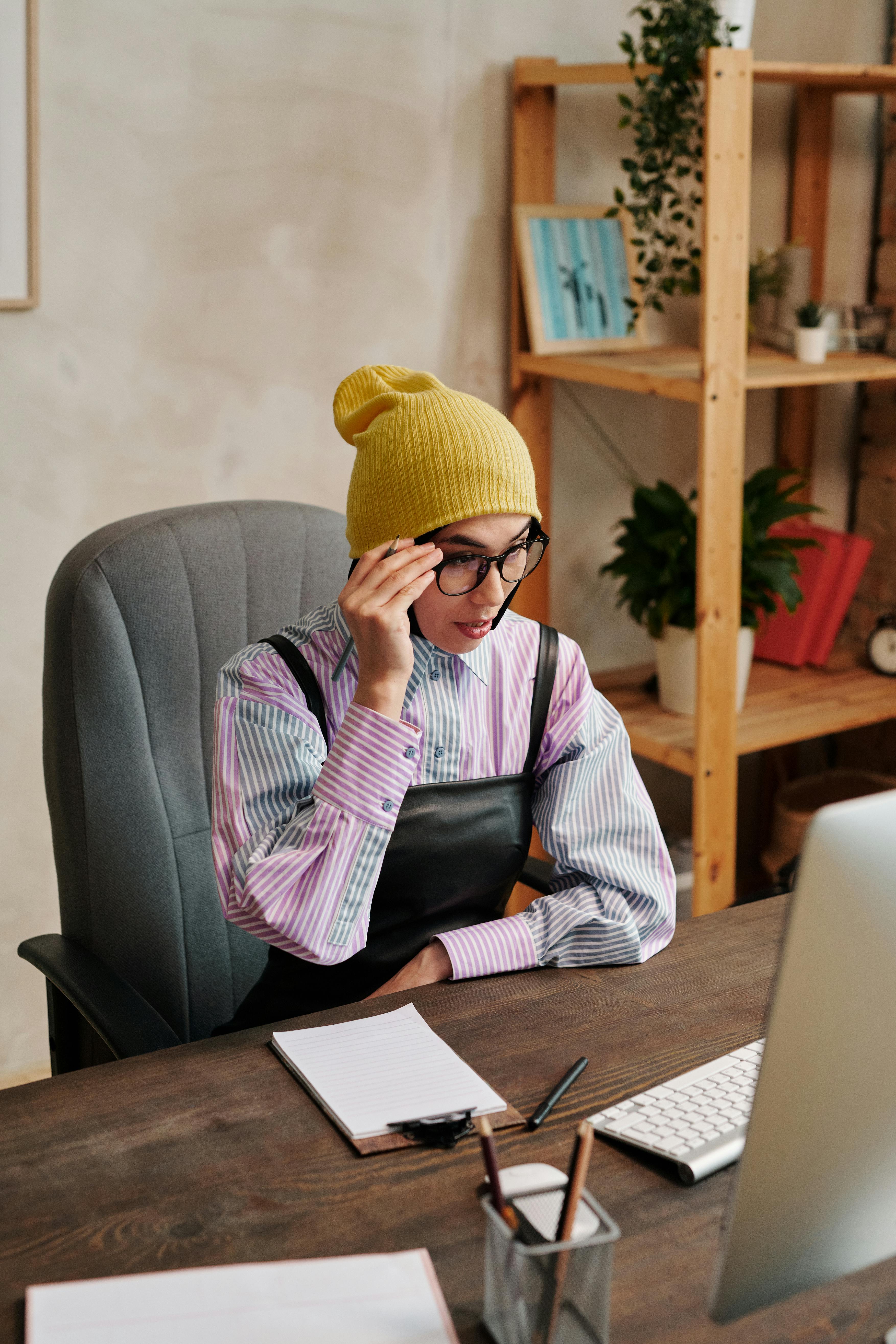 Woman In Glasses Working On Computer In Office · Free Stock Photo