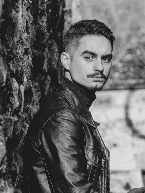 Free stock photo of black and white, black leather jacket, mustache