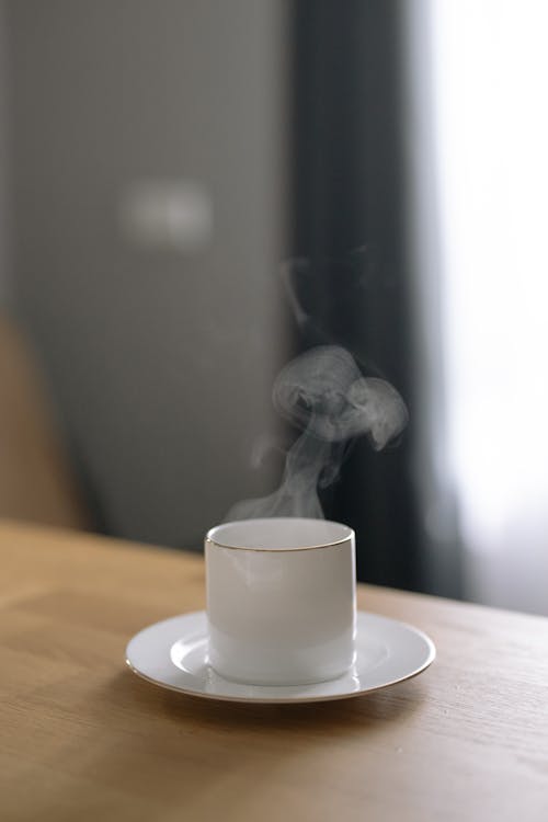 Steam from Cup on Table · Free Stock Photo