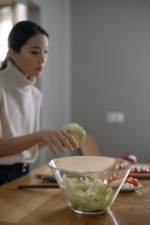 A Woman Making a Vegetable Salad