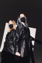 Photo Of Women Standing Back To Back
