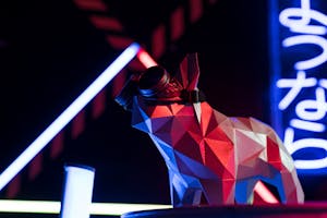 A Dog Figurine Wearing Goggles Near Neon Lights 