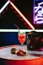 Clear Wine Glass With Pink Liquid Inside