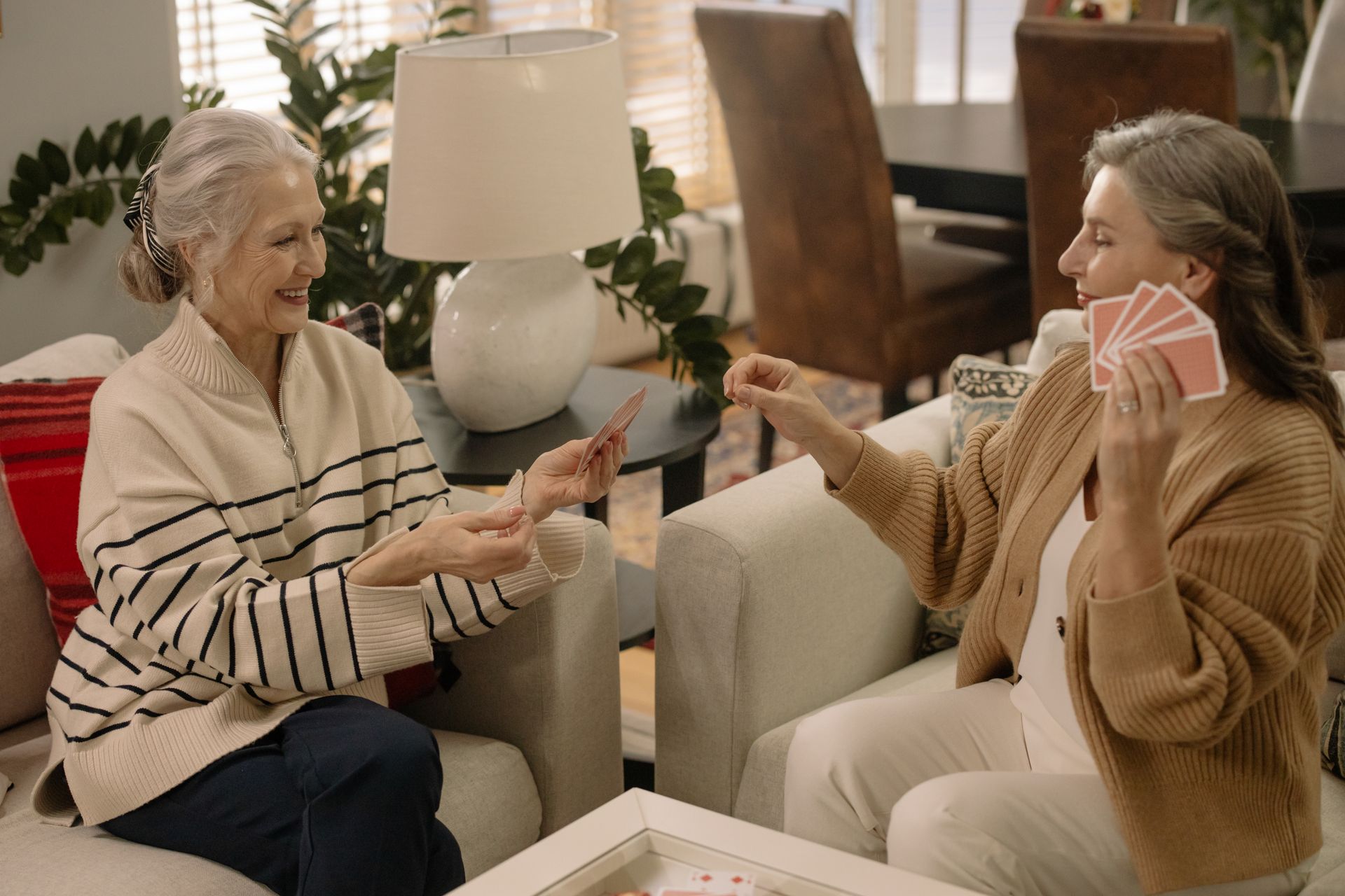 Elderly Women Playing a Card Game