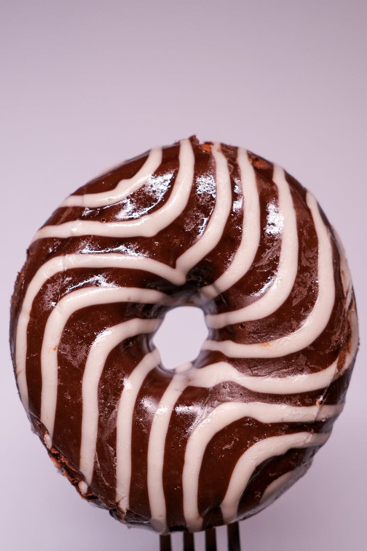 Delicious Glazed Doughnut Against Gray Background