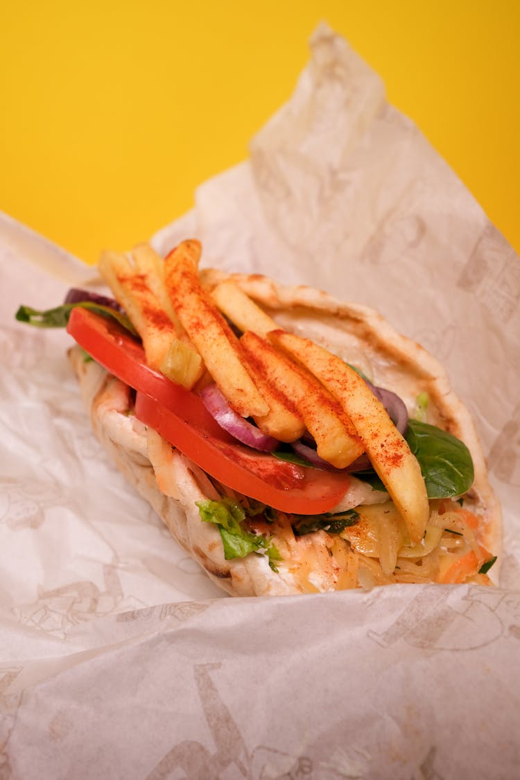 Gyro With Pita And French Fries With Vegetables And Herbs