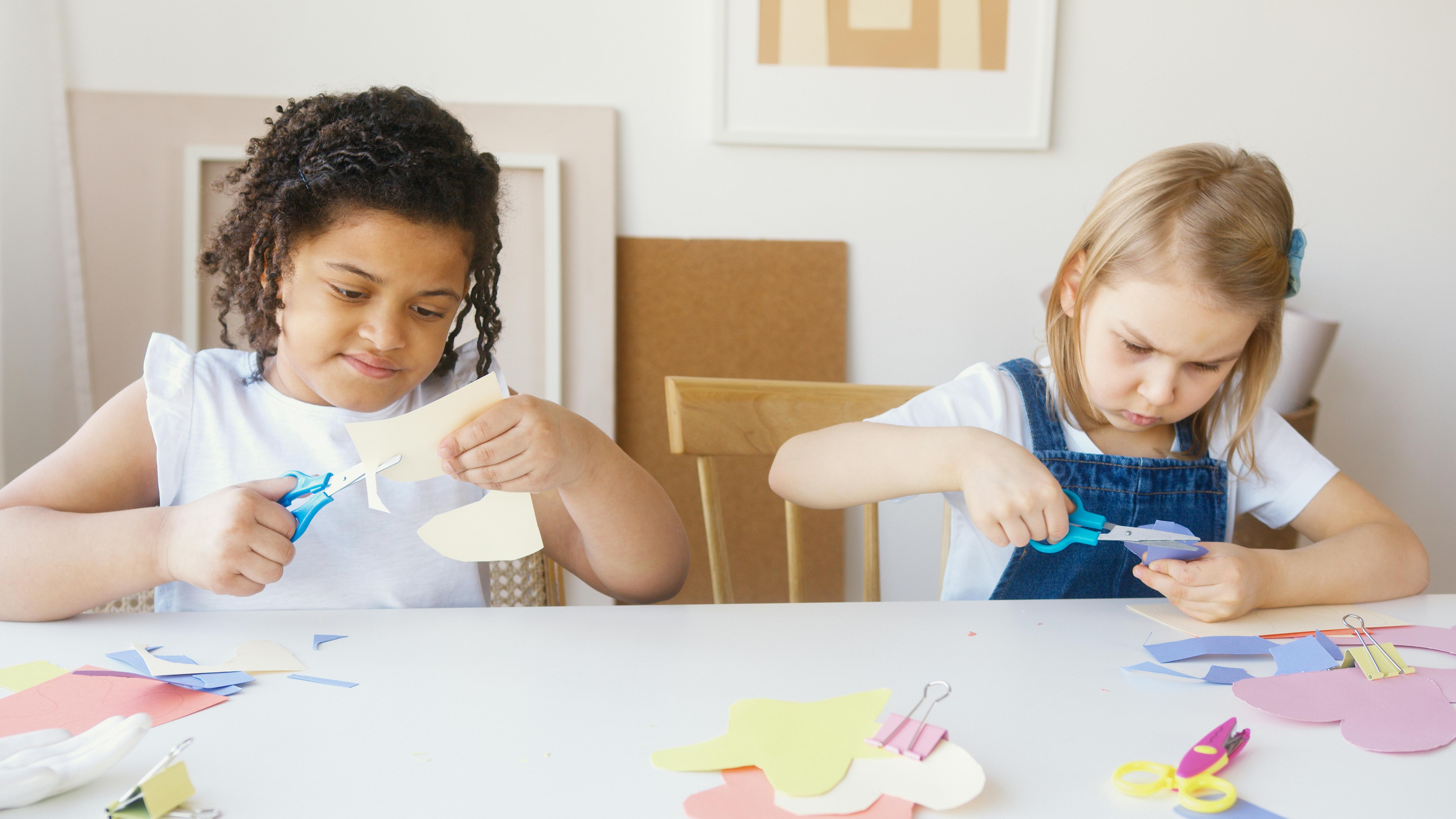 two kids doing some artworks