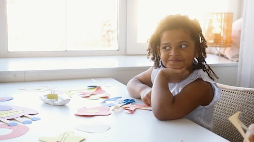 Free Girl Leaning on a Table Stock Photo