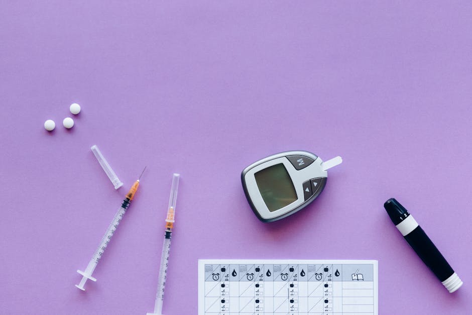 Flat lay of diabetes management tools including glucometer, syringes, and pills on purple background.