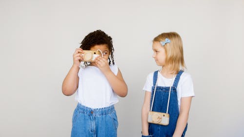 Free Two Kids Looking at Each Other Stock Photo