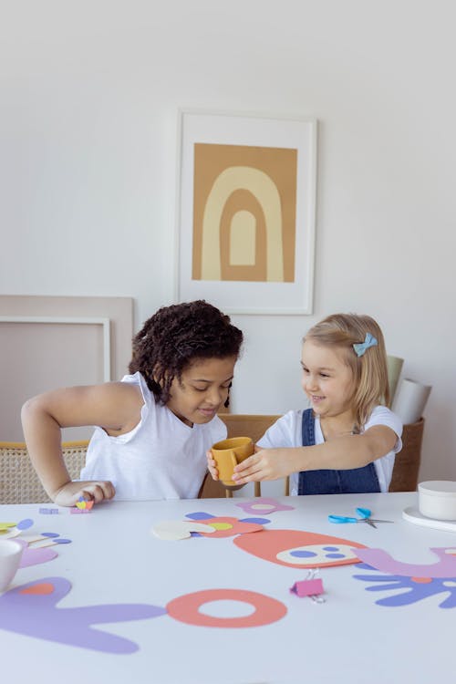 Two Kids Doing Some Artworks