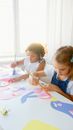 Two Kids Doing Some Artworks
