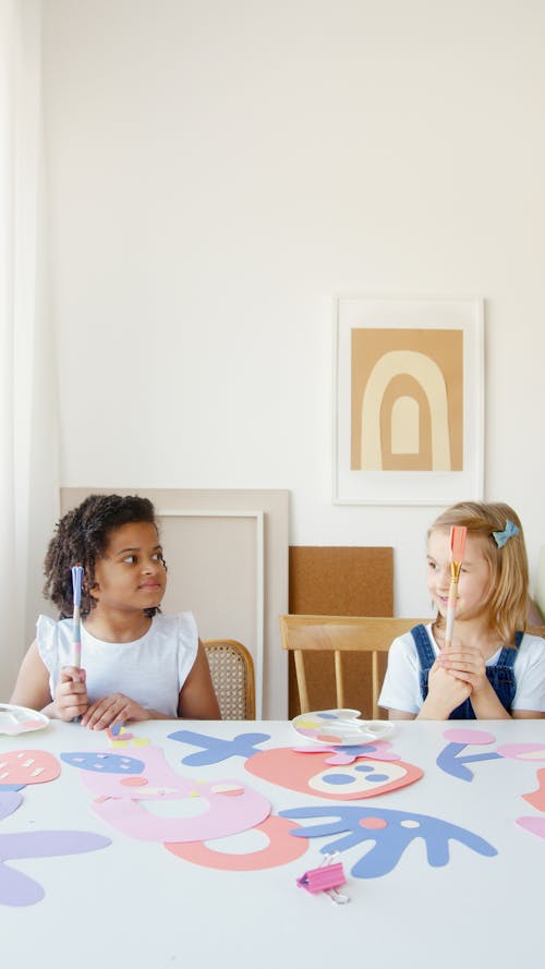 Two Kids Doing Some Artworks