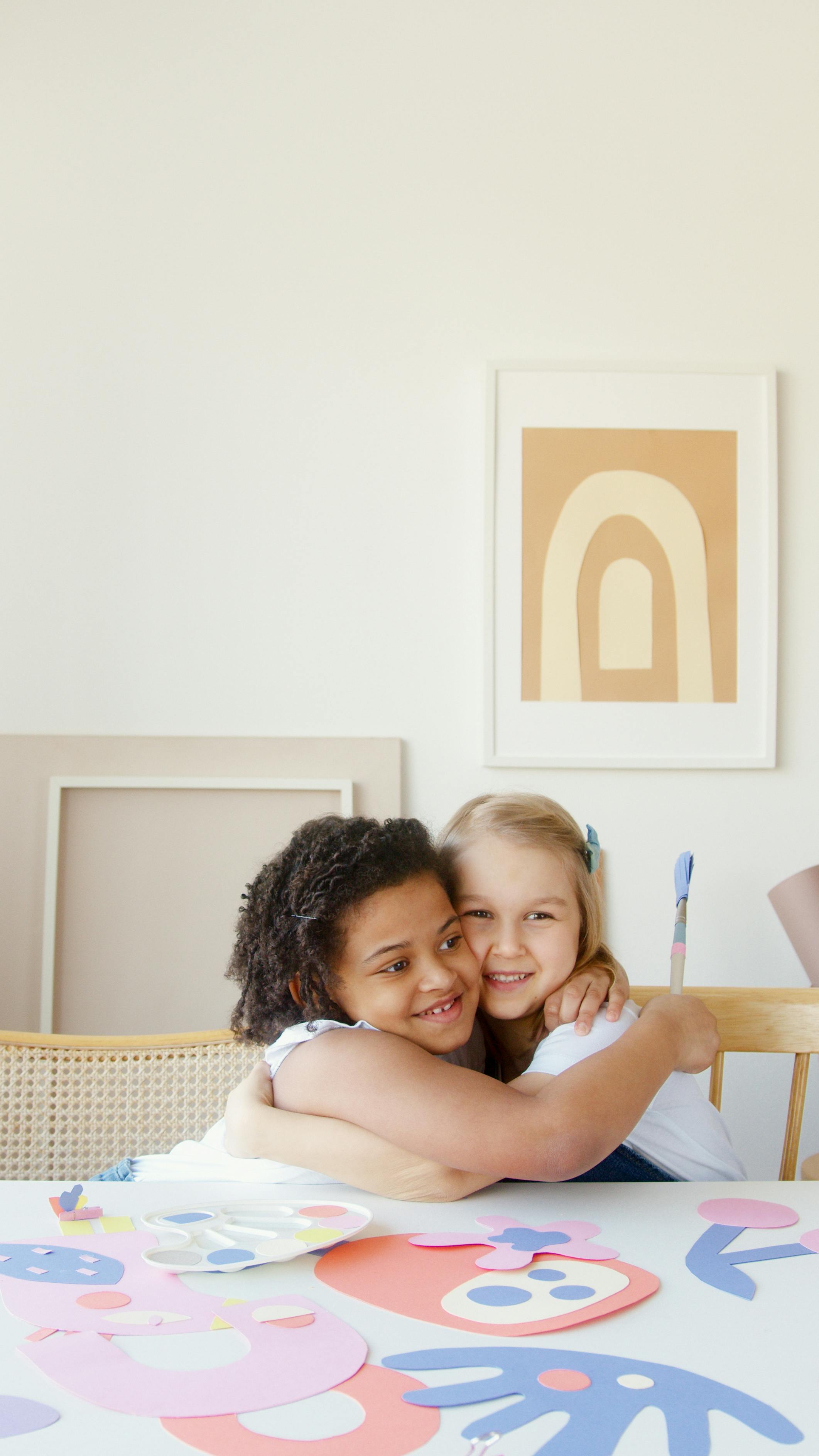 two kids hugging each other