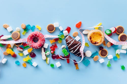 Assorted Doughnuts on Blue Table