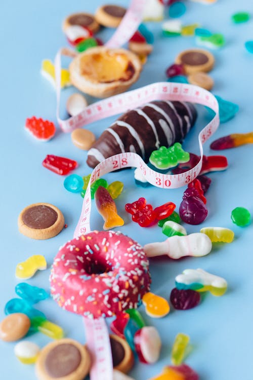 Sweet Food and Candies on a Blue Surface