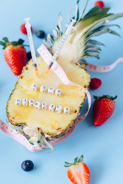 Letter Dice on the Top of a Pineapple