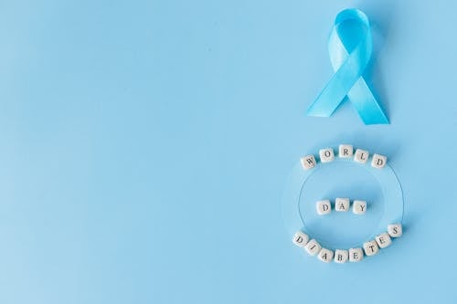 Letter Blocks and a Ribbon on a Blue Background