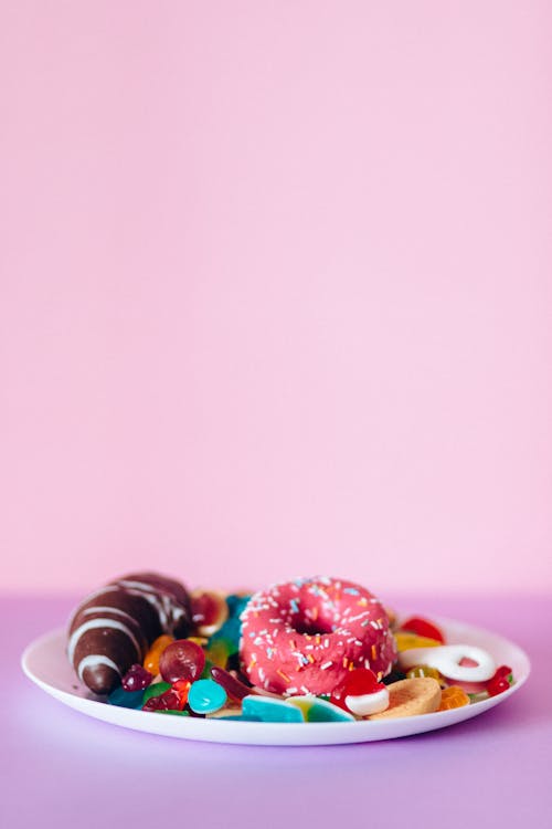 Foto profissional grátis de balas, classificado, donut