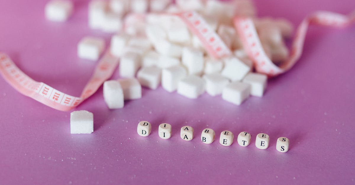 Still life of sugar cubes and diabetes concept with a tape measure, highlighting health awareness.