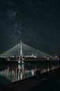 Cable stayed bridge near sea at night time