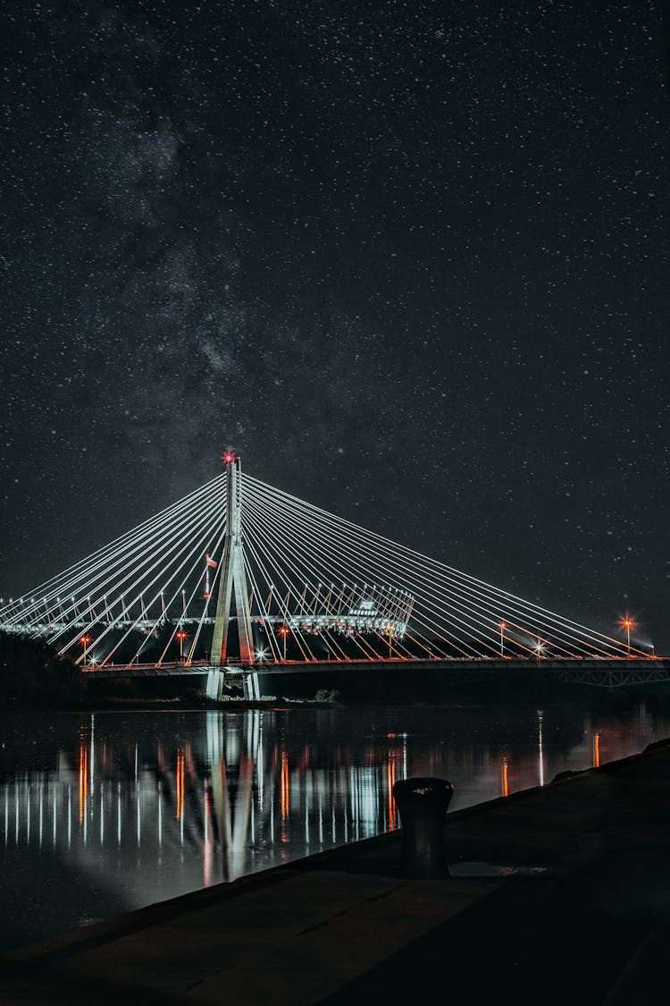 Cable Stayed Bridge Near Sea At Night Time