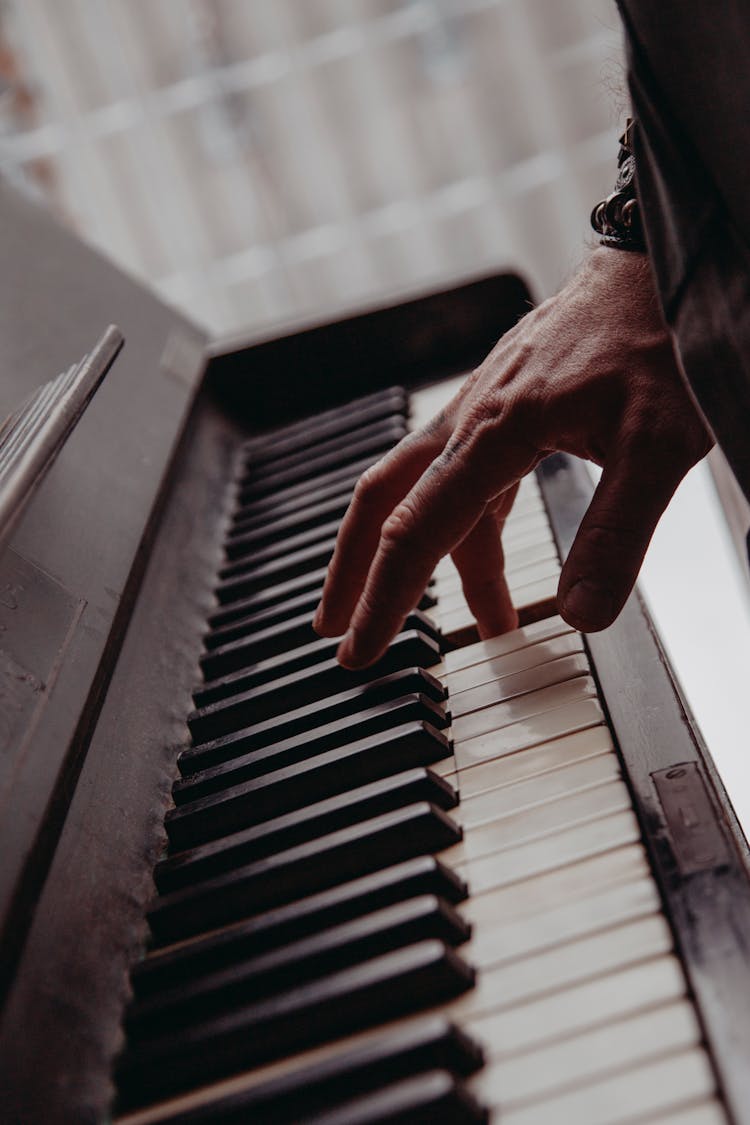 Hand Playing Piano