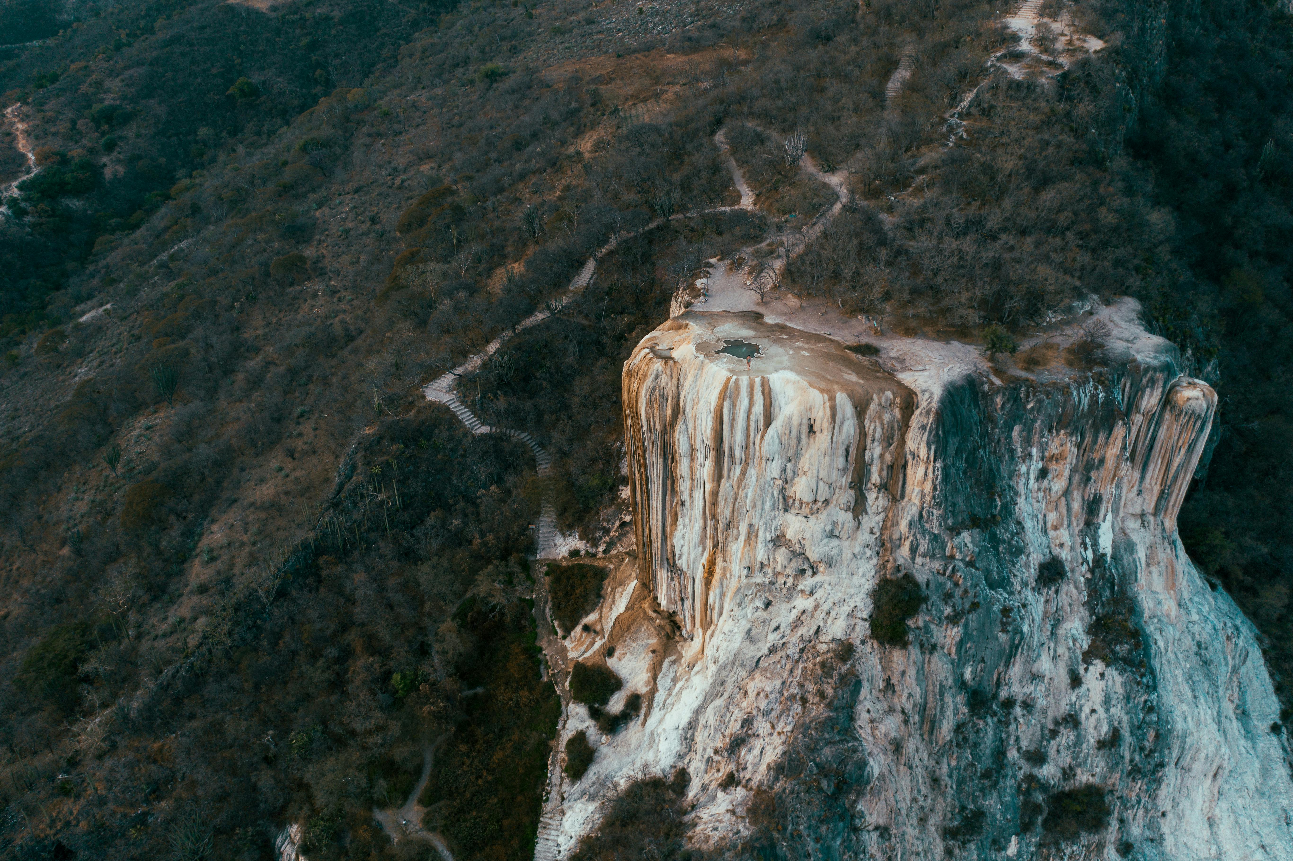 people walking on rocky mountain