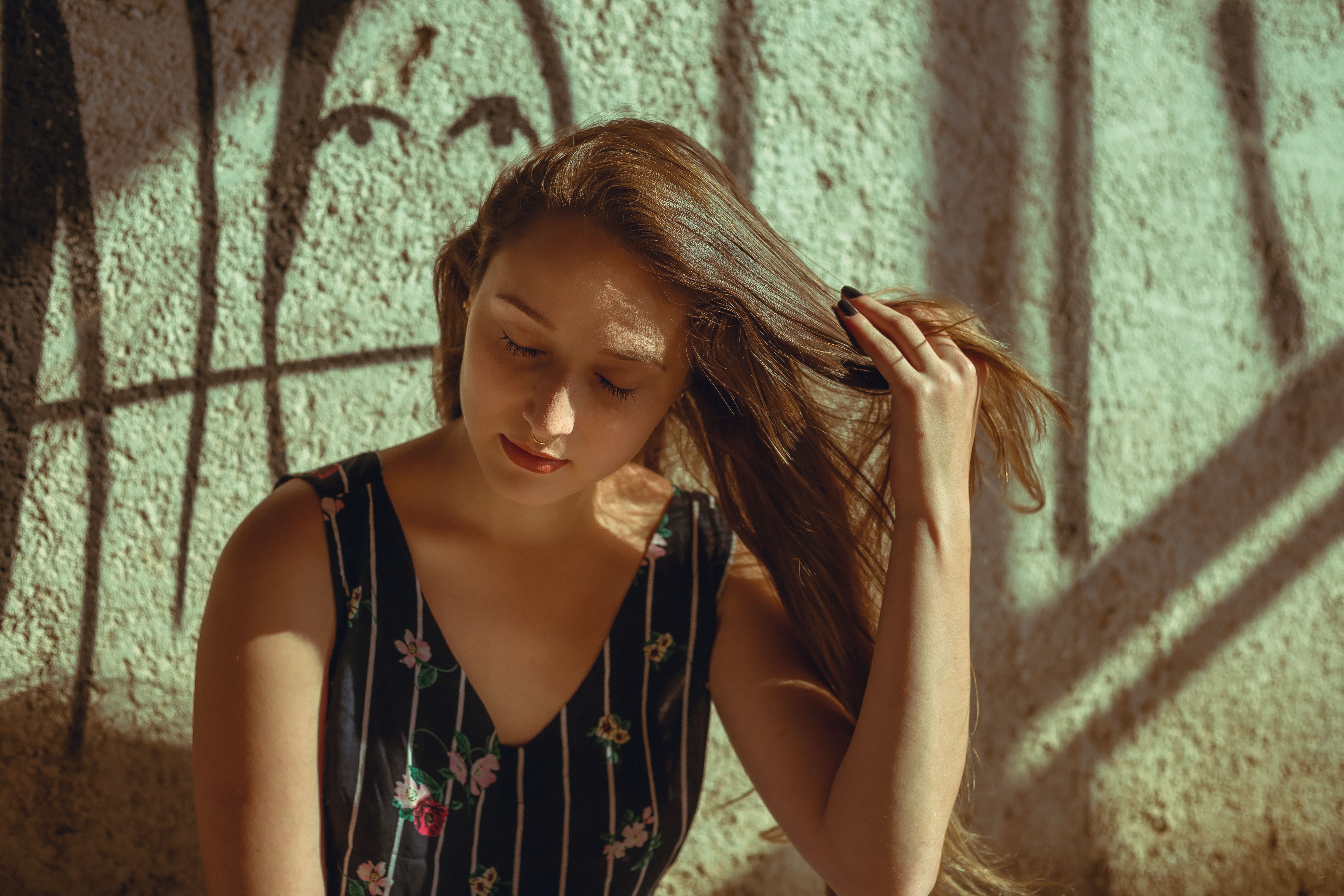 A Woman Wearing a Floral Top · Free Stock Photo