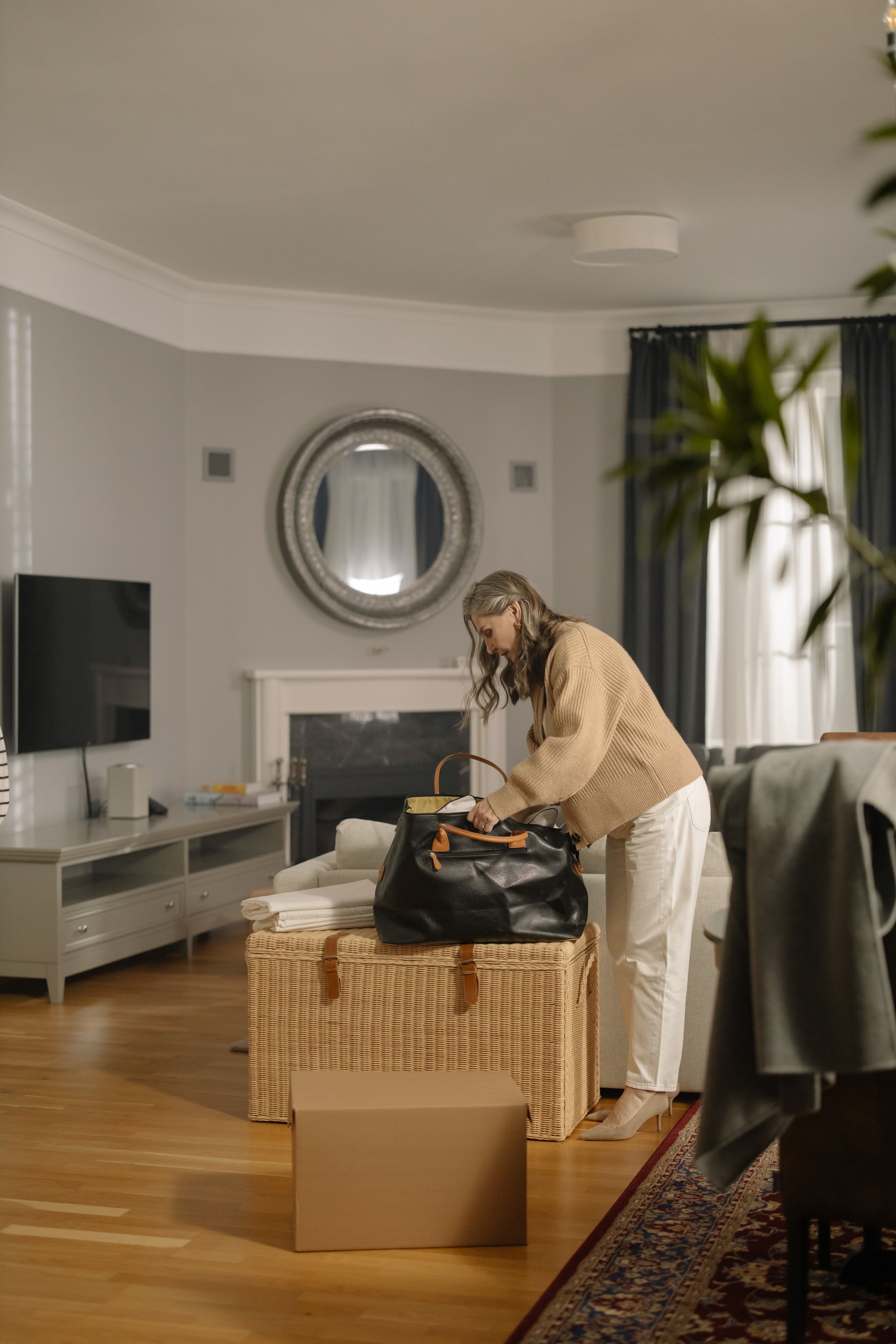 Older adults packing belongings during a home transition