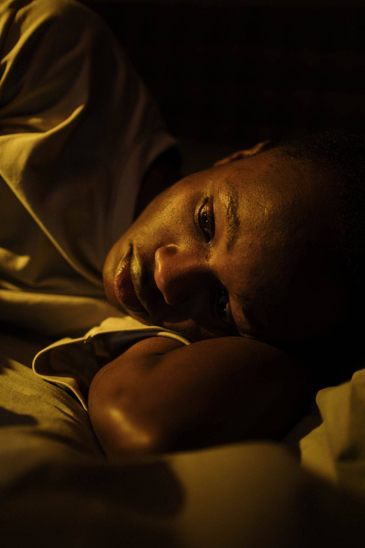 Person experiencing difficulty sleeping