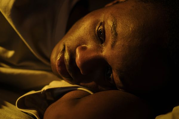Man lying awake at night
