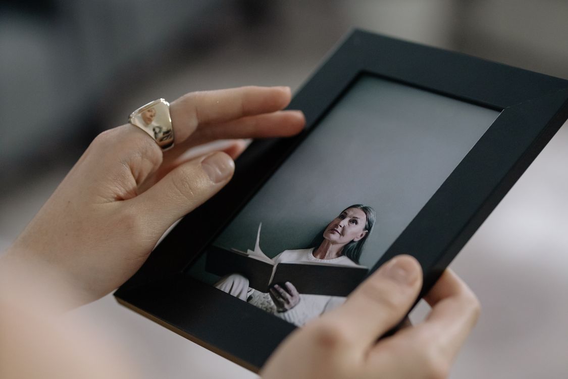 Person Using Frame Person Holding Black Picture Frame · Free Stock Photo