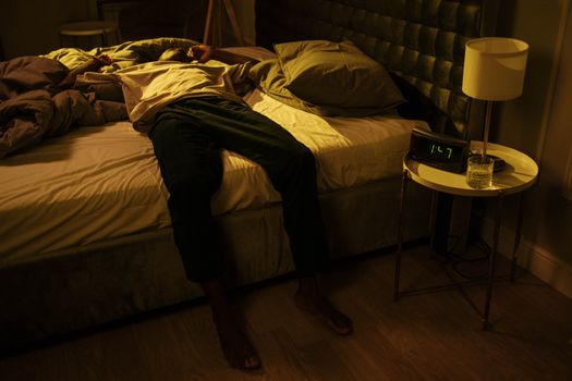 A Man Lying Down on Bed