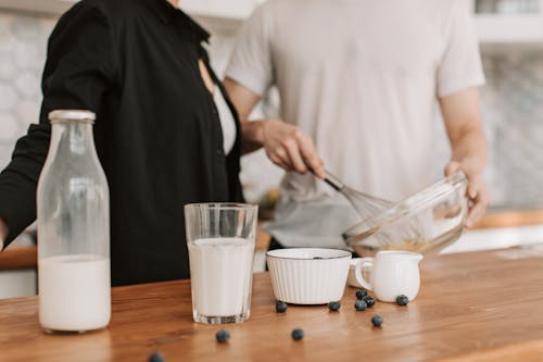 Close-up of a Bottle of Milk and Tableware