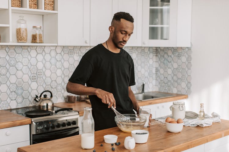 Man Baking At The Kitchen 