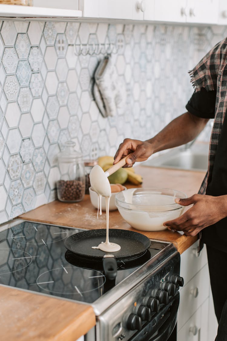 A Person Cooking Pancake