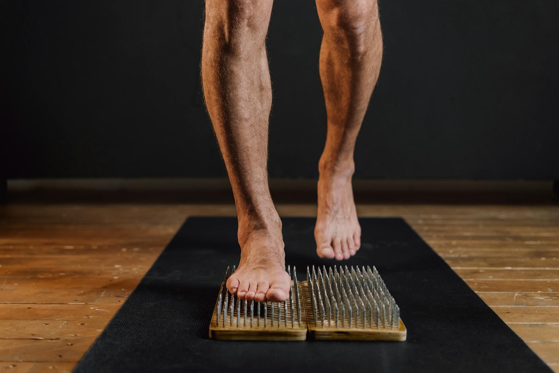 Person standing on a wooden board
