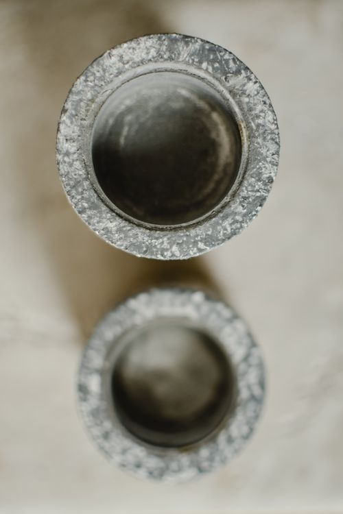 Free Textured metal candle holders photographed in Estonia from above. Stock Photo