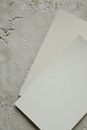 White Printer Paper on White Concrete Wall
