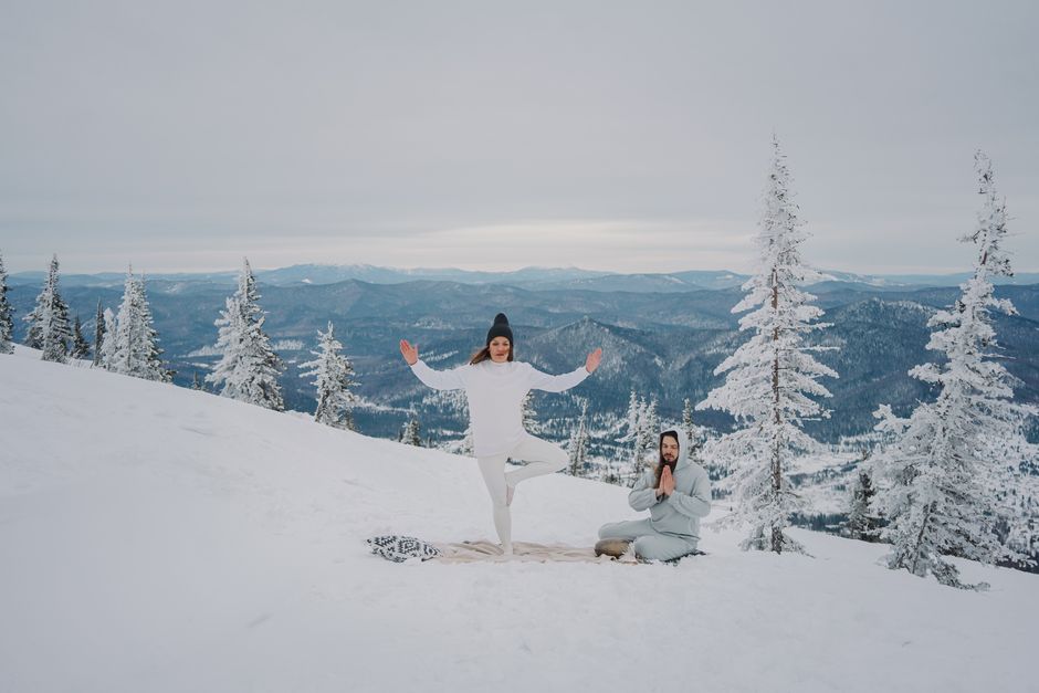 Glass-walled yoga shala overlooking pine forest in Dunagiri