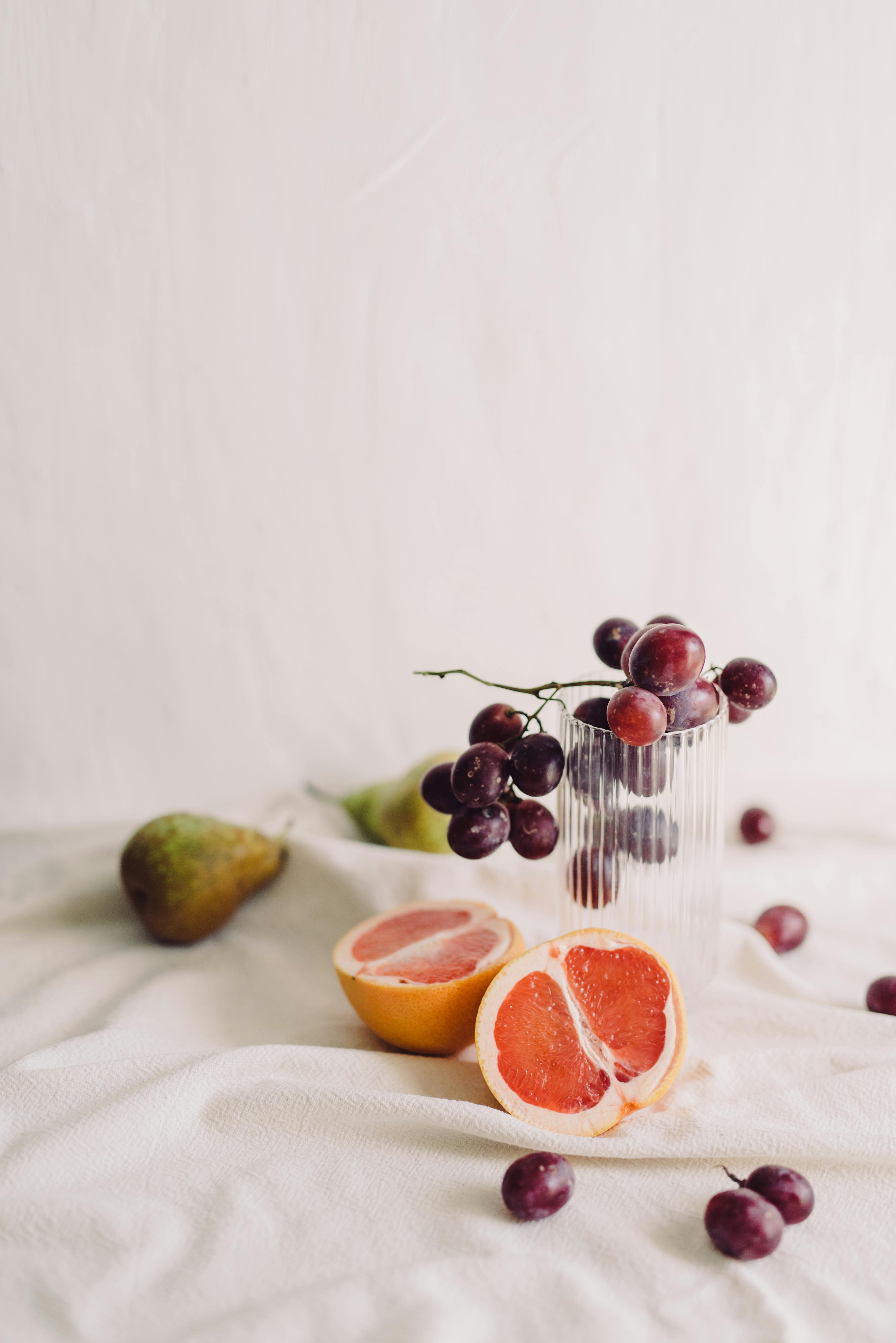 Grapes on Clear Drinking Glass · Free Stock Photo