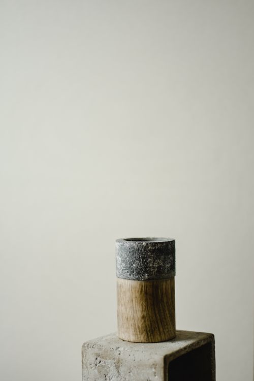 Free Elegant minimalist stone and wood home decor with natural textures. Stock Photo